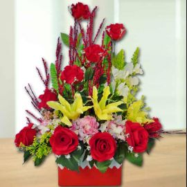 Artificial Yellow lilies & Red Roses Table Arrangement Delivery