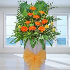 Orange Gerbera Opening Stand Flowers Arrangement